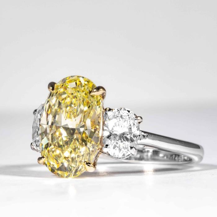 4 55 carat fancy yellow oval cut 3 stone canary diamond ring gia certified 100000 200000 01ctw engagement shreve crump low 298