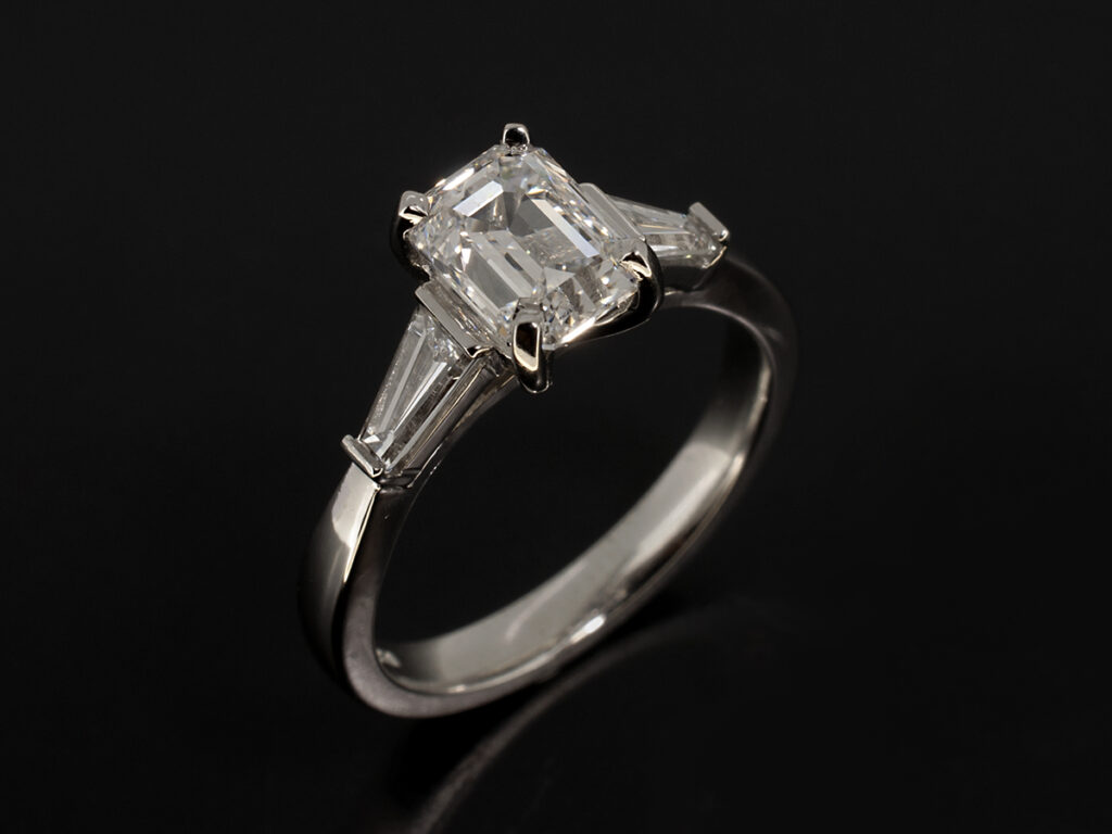 Ladies Diamond Trilogy Engagement Ring Platinum 4 Claw and Bar Set Design Emerald Cut Lab Grown Diamond 1.51ct F Colour VS1 Clarity VGVG Tapered Diamond Side Stones x2